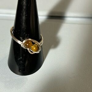 Silvertone ring with tigers eye